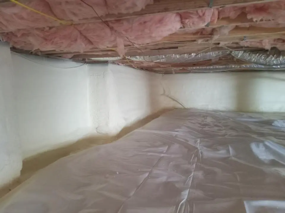 Crawl space encapsulation with closed-cell spray foam for Commercial Roof Restoration in Michigan City